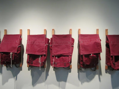 Workingman Collective Pack, 2011 Fir, oak, waxed canvas (Wendy Downs, MOOP, PA) 30h x 15w x 8d in, installation