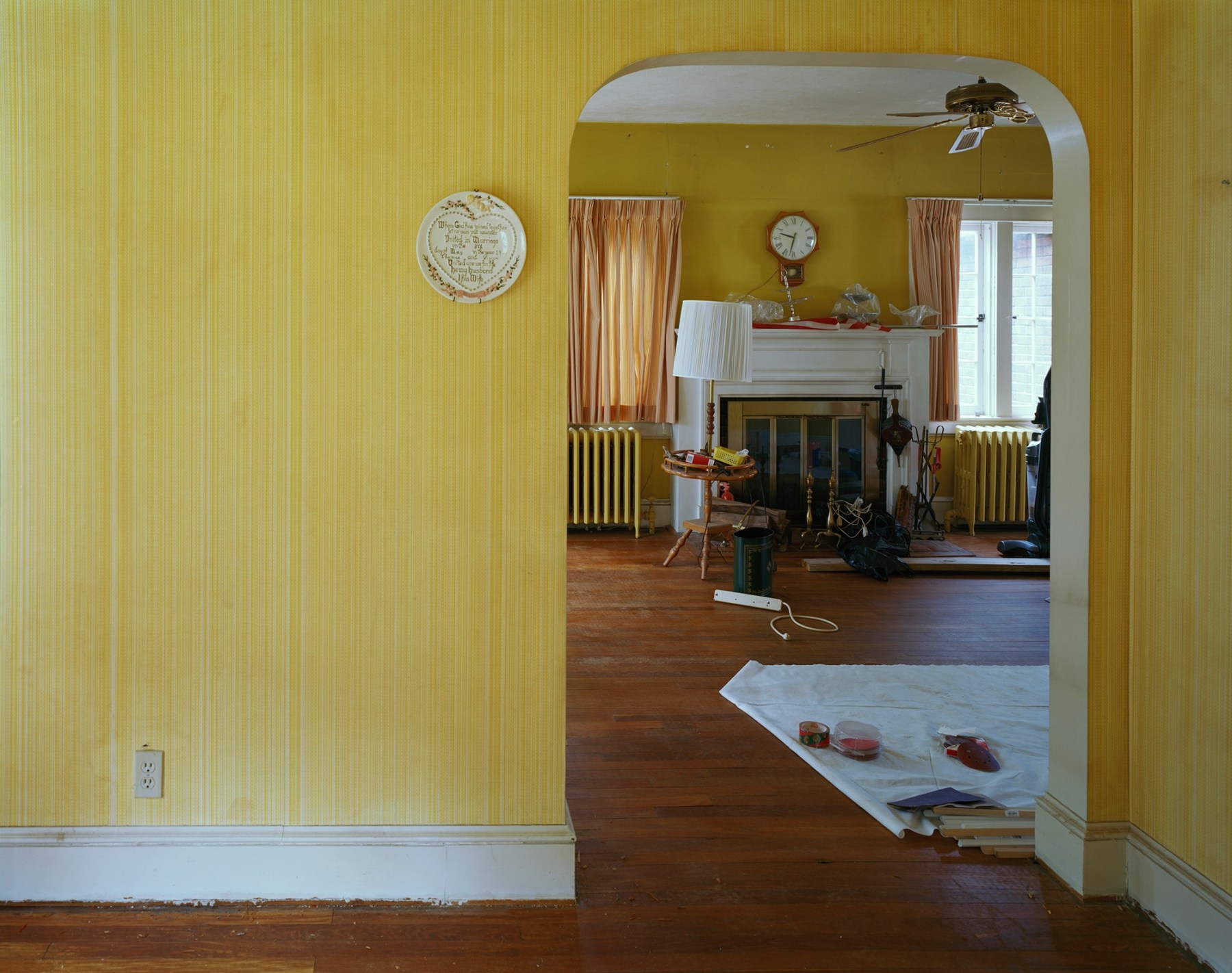 Photograph of interior of house with yellow walls