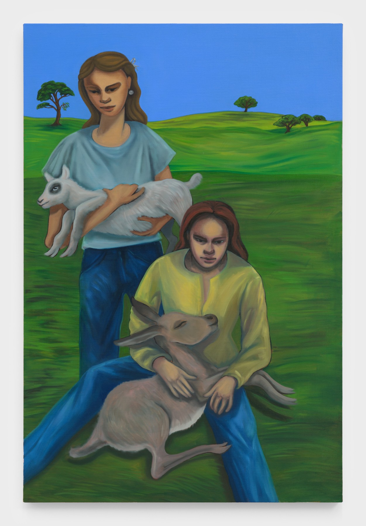 Bambou Gili's artwork "The Favorites". Two women wearing blue jeans and t-shirts hold a fawn and a lamb in a green field with blue skies. 45 x 30 in (114.3 x 76.2 cm), oil on linen, 2023
