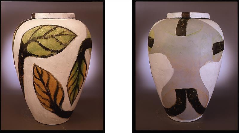 front and back of a vase with leaves sprouting from the back side