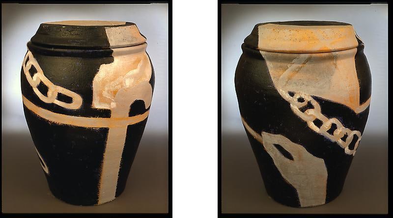 front and back of a vase featuring a hand and a chain wrapping around it