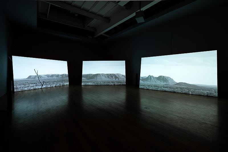 installation view of three video projections