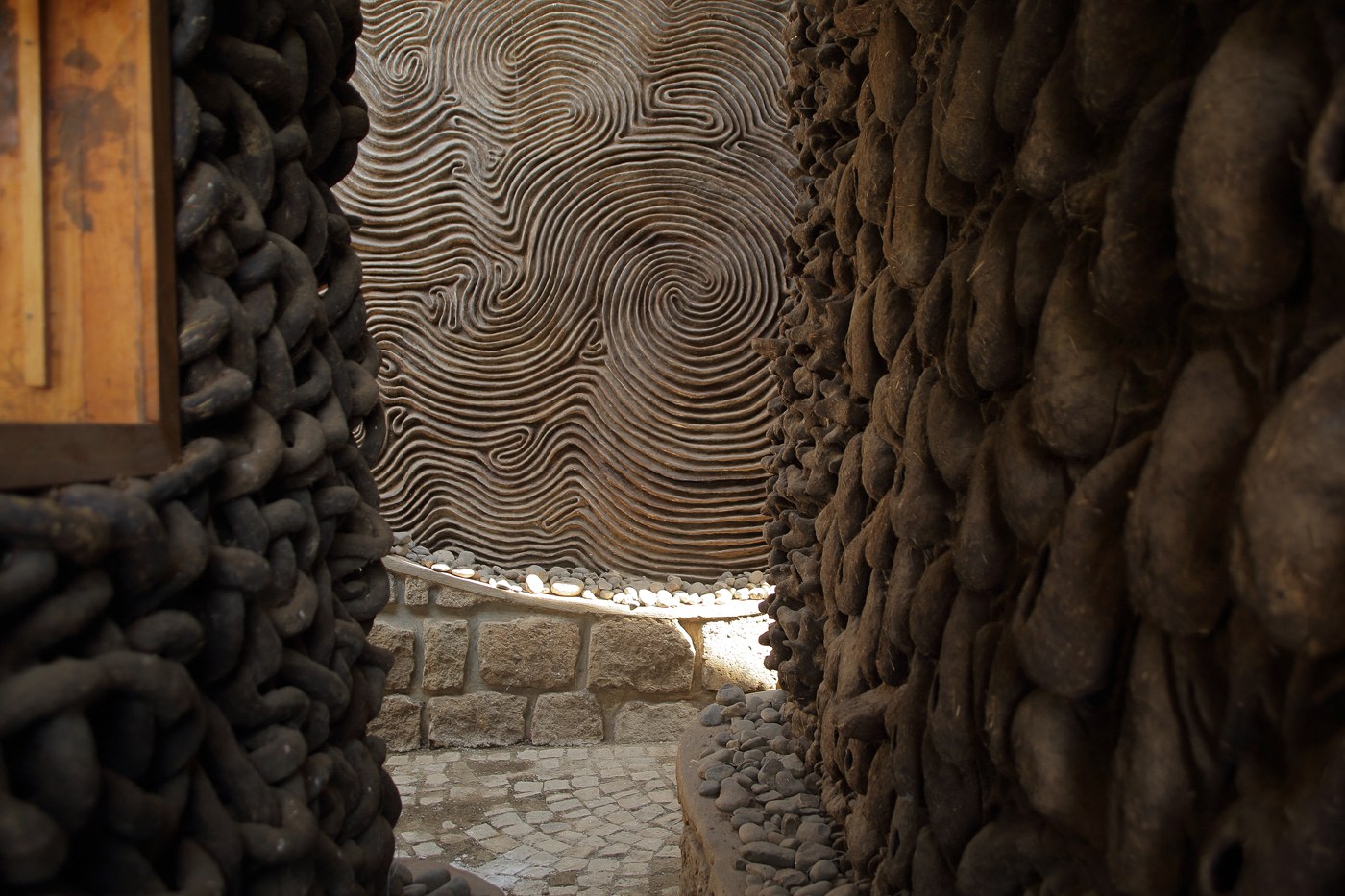 woven and swirling walls