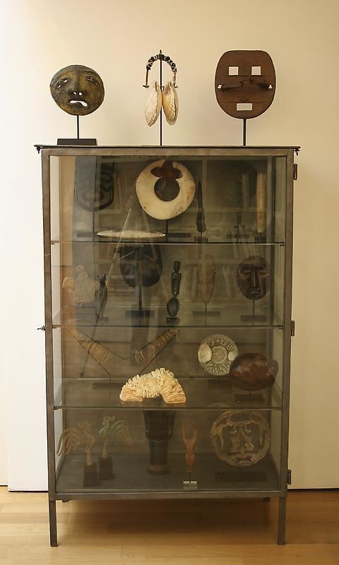 glass case containing objects