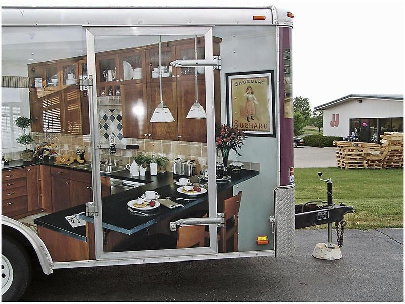 trailer with an image of a kitchen plastered on it