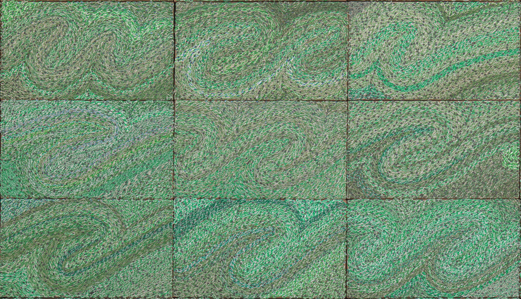 swirly, green surface composed of electrical components