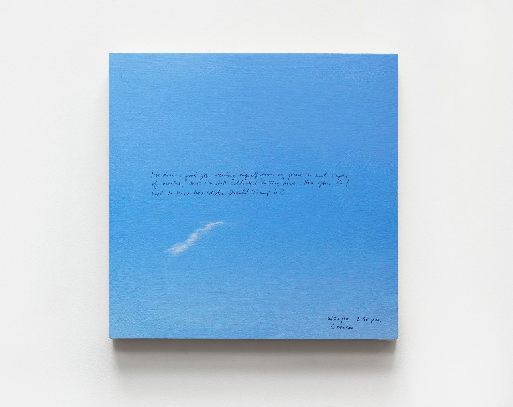 A clear blue sky with a handwritten paragraph