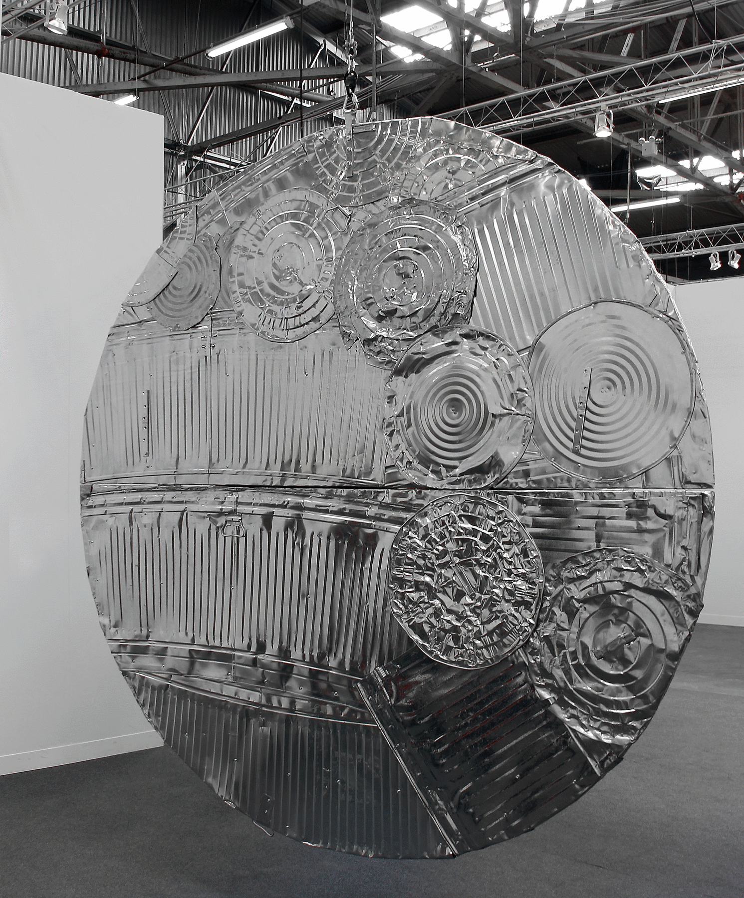 Wood and galvanized steel hanging circular sculpture