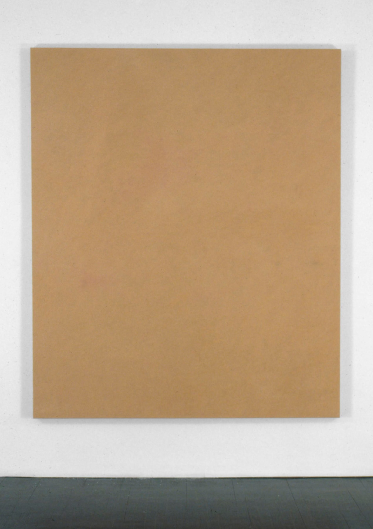 A painting of human skin color with an olive undertone