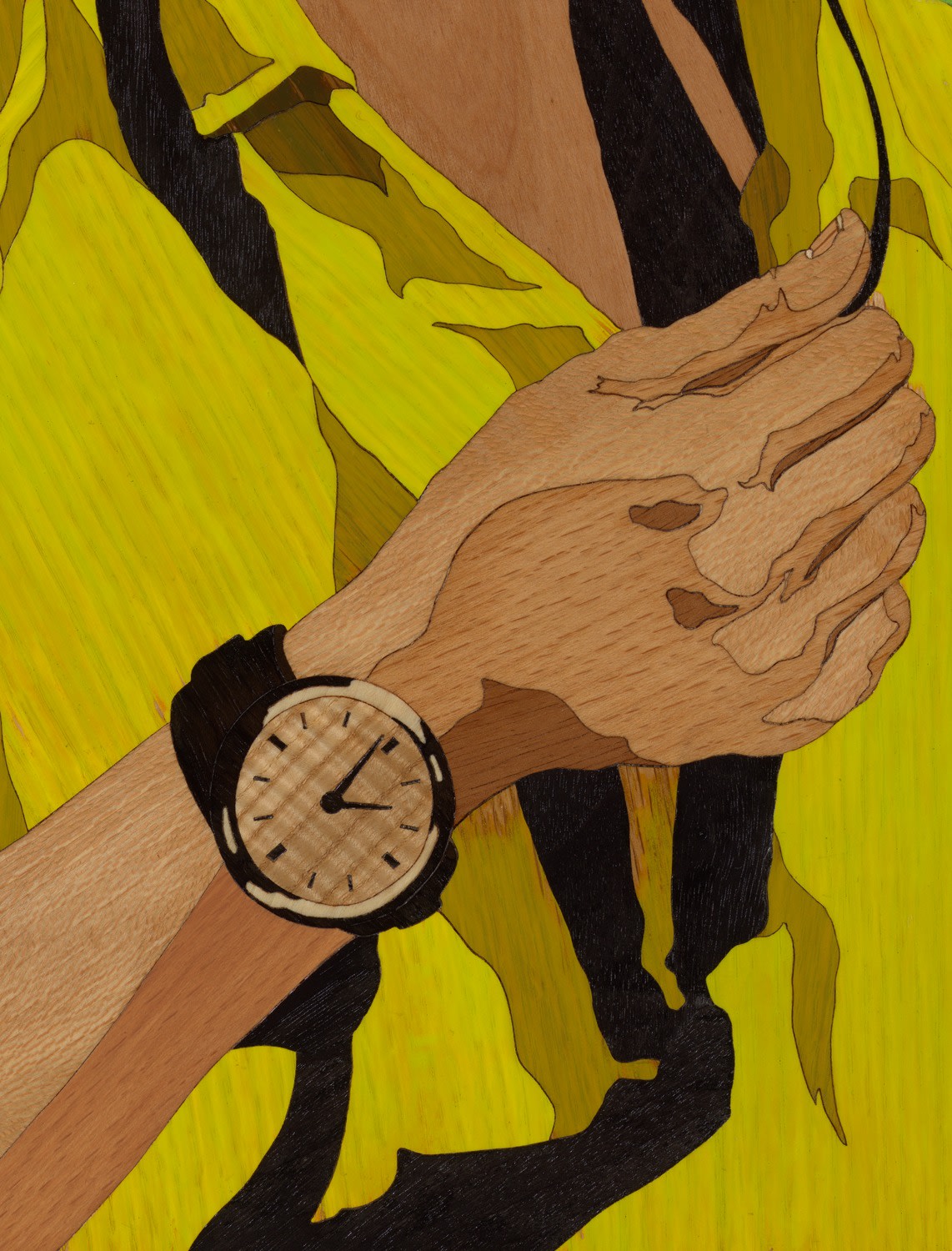 close up a woman's arm with a wristwatch; she is wearing a yellow jersey