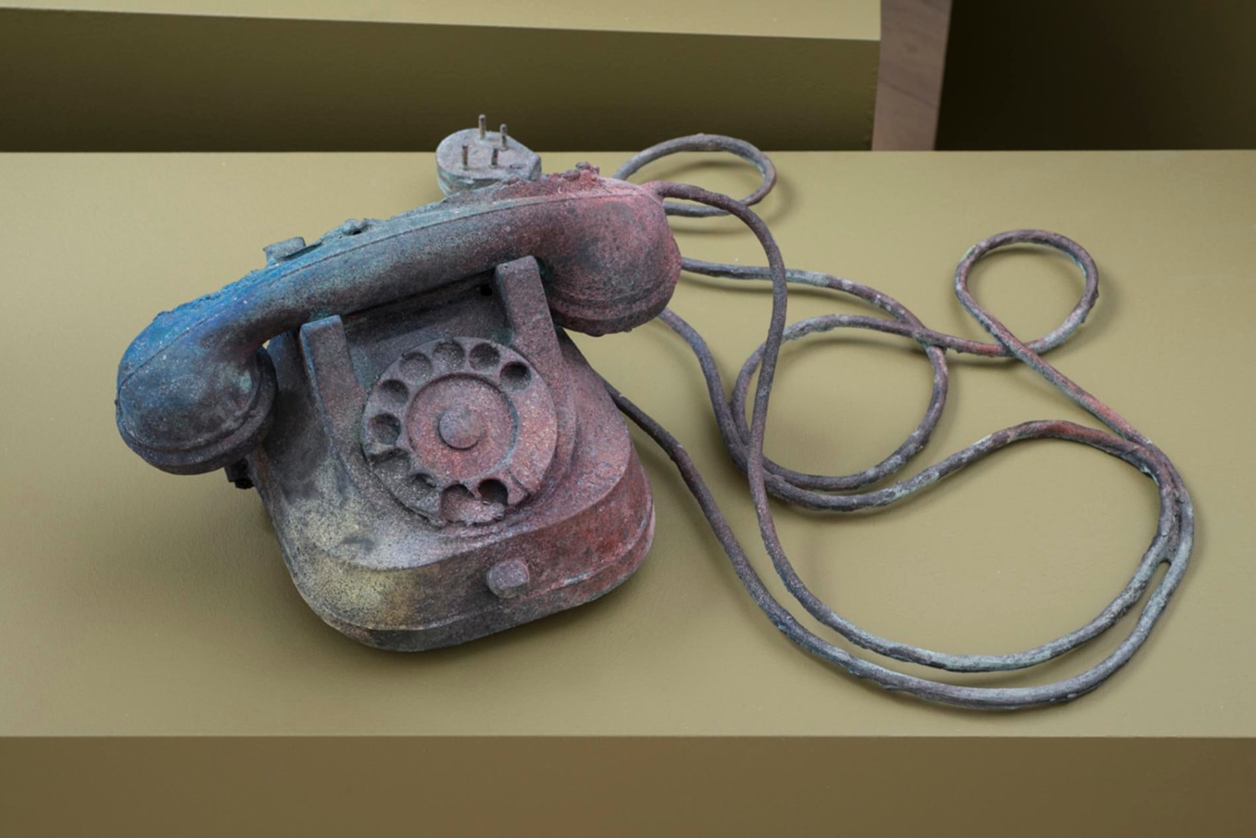 old telephone covered in different hues