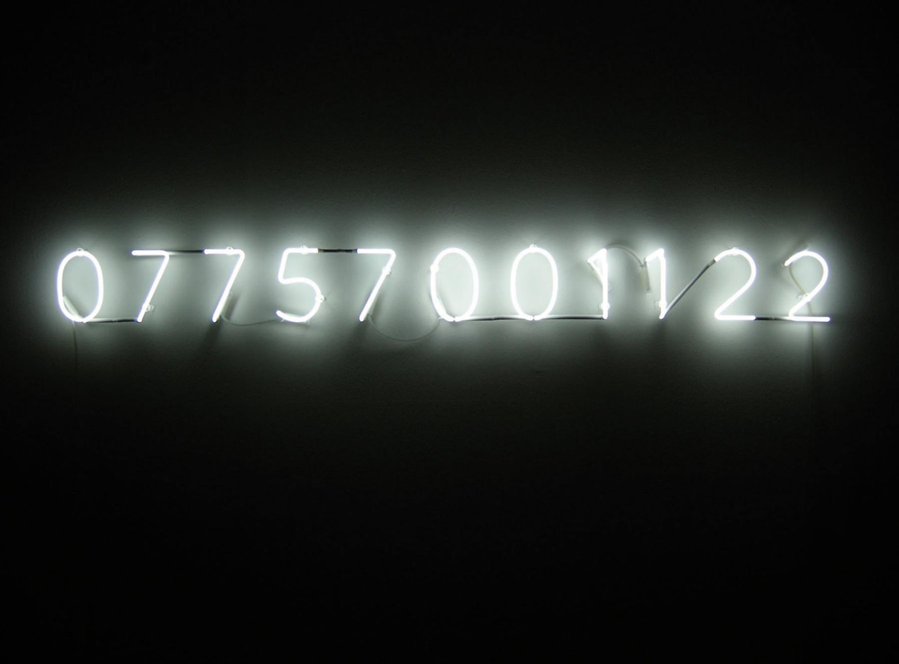 white, neon sign composed of numbers