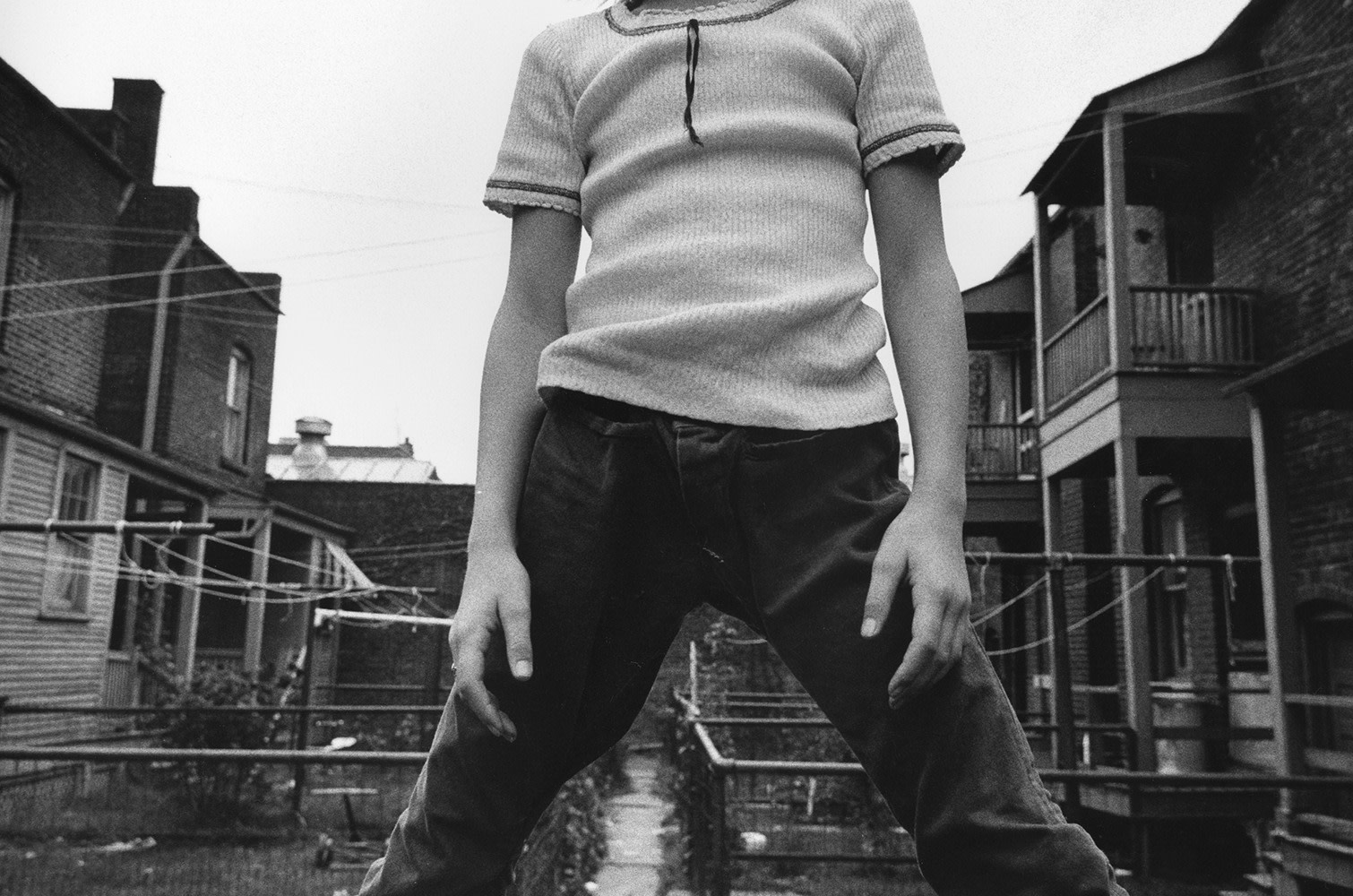 Defiant Girl up on Fence, October 1973, 16 x 20 inches