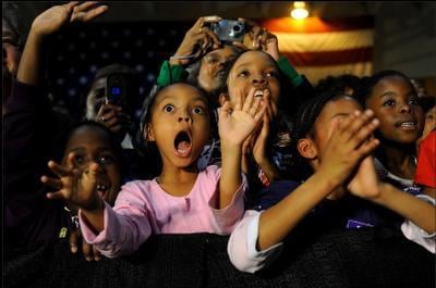 Scout Tufankjian. Shaniece Sprattling, 8, Ilona Cooper, 5, Imani Cooper, 10, Indya Cooper, 8, and Ciera McNeil, 10 (L-R) cheer as Barack Obama speaks at a rally in Dillon, SC on January 23, 2008.