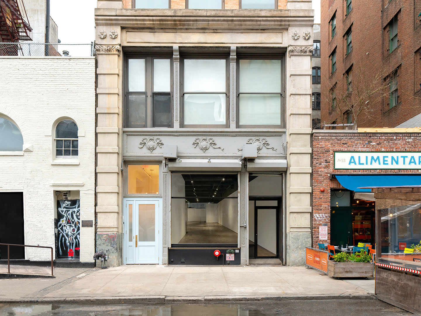 View of the facade of Venus Over Manhattan's new gallery space at 55 Great Jones Street in New York City