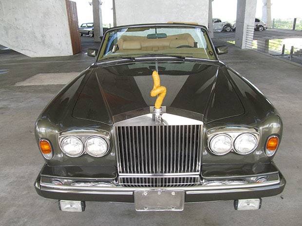Franz West topped off this Rolls Royce with a curly penis. Or a curly french fry., &nbsp;