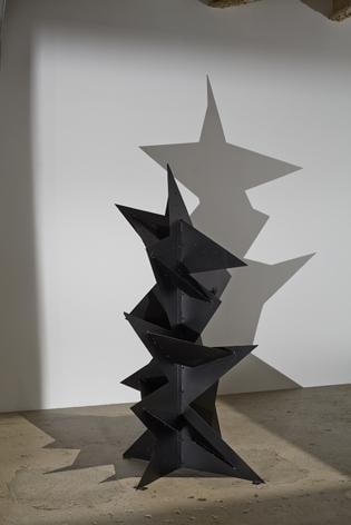 In the darkened gallery, even stationary works like &#039;Monsieur Loyal (Ringmaster)&#039;, 1967, pictured here, and &#039;Red Curlicue&#039;, 1973 have a larger-than-life presence. Both are maquettes, which reveal a little about how Calder sought to resolve scale issues when he designed his monumental stabiles