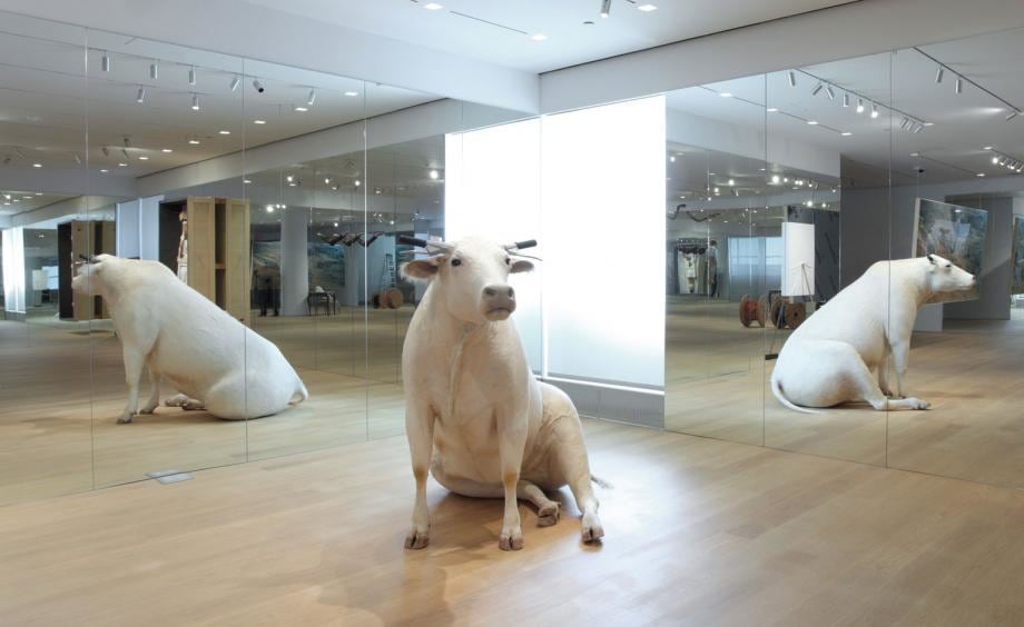 There are animal-centric creations, like the &#039;Untitled&#039; sitting cow (pictured) with motorcross handles for horns, and the Italian pavilion-inspired &#039;Turisti&#039; (1997), which sees taxidermy pigeons scattered throughout the gallery