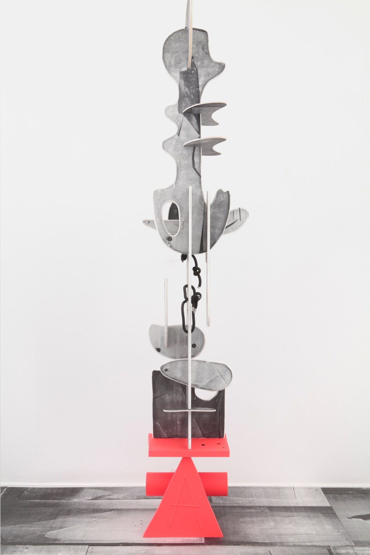 &quot;Zutz&quot;, 2012 Ink, silkscreen and spray paint on wood with rope on painted aluminum base