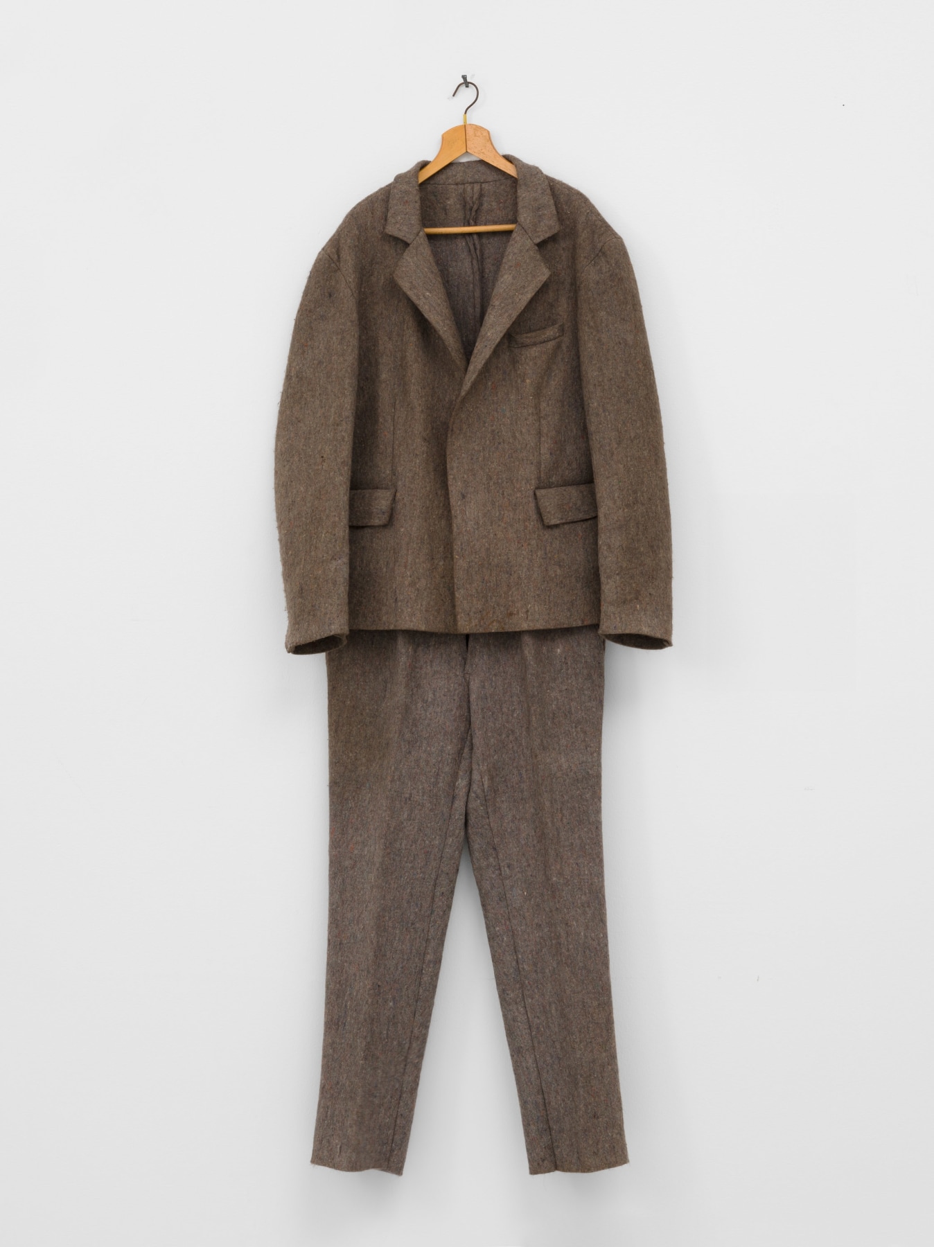 Joseph Beuys

&amp;ldquo;Filzanzug (Felt Suit)&amp;rdquo;, 1970

Felt, wooden hanger

Edition 87 from an edition of 100 + 10 HC

80 x 28 x 8 inches

203 x 71 x 20.5 cm

BEU 133

NFS