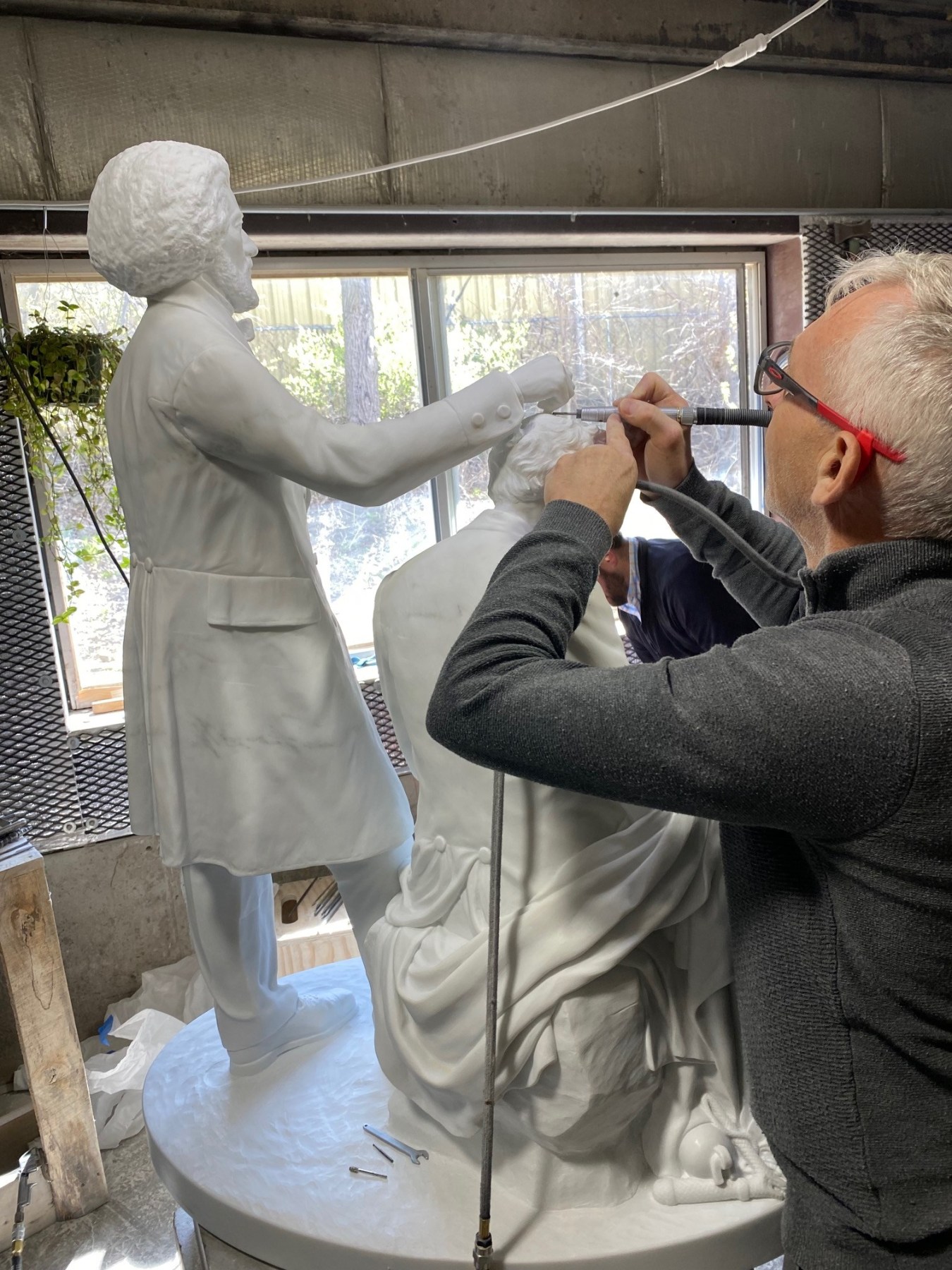 Master carver Martin Foot at Quarra Stone.