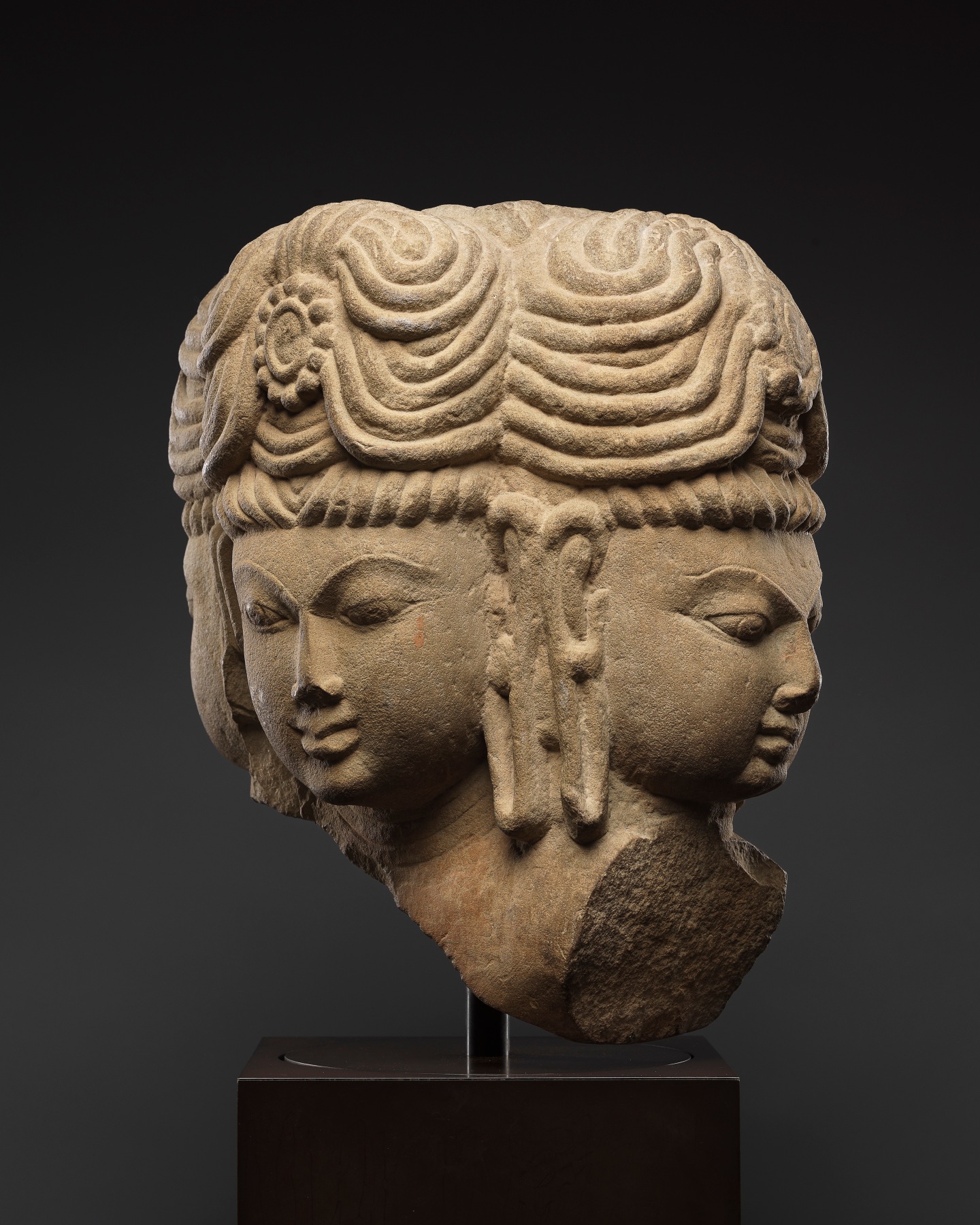 the four heads of Brahma hold deep symbolic meaning in both theology and iconography. 