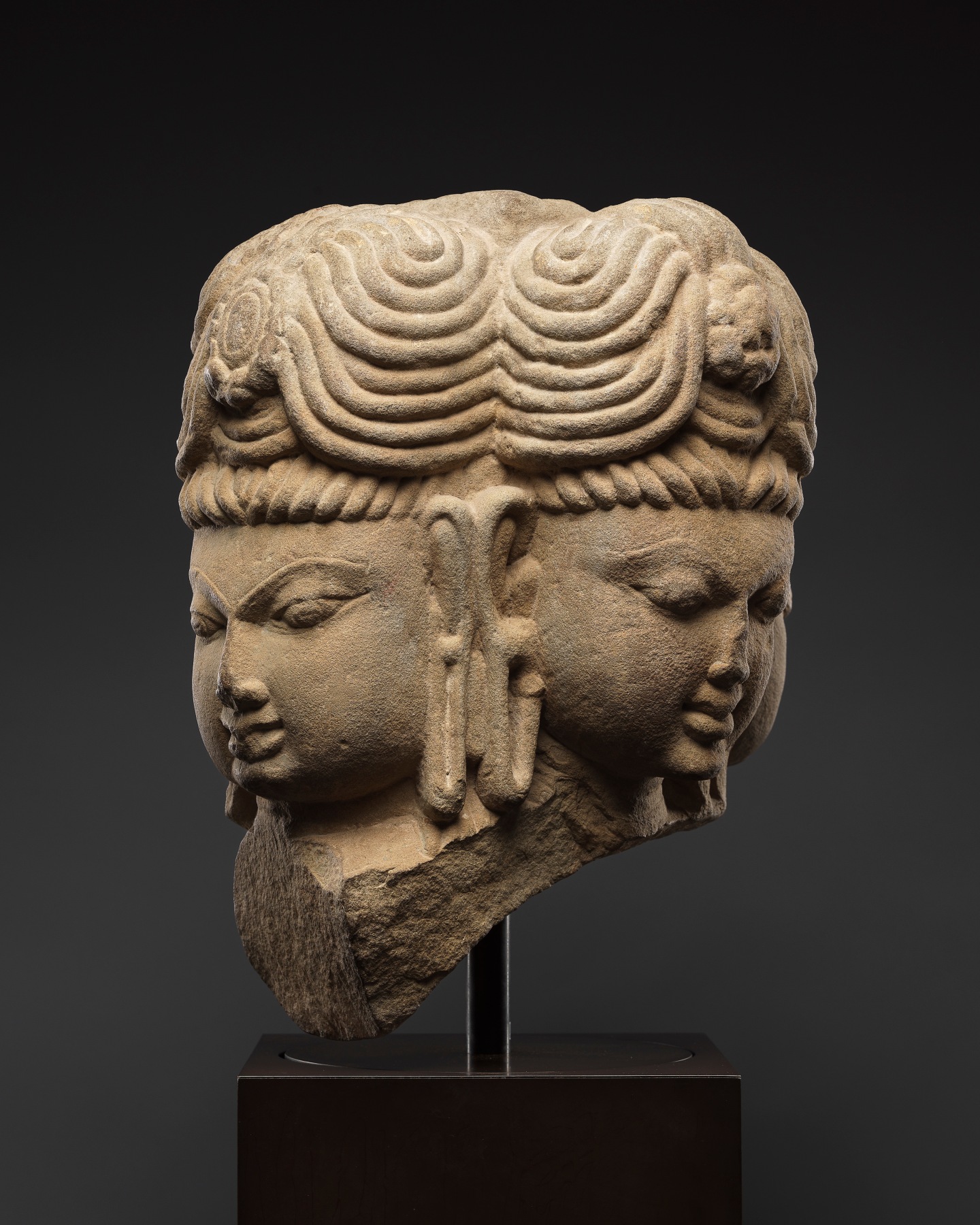 the four heads of Brahma hold deep symbolic meaning in both theology and iconography. 