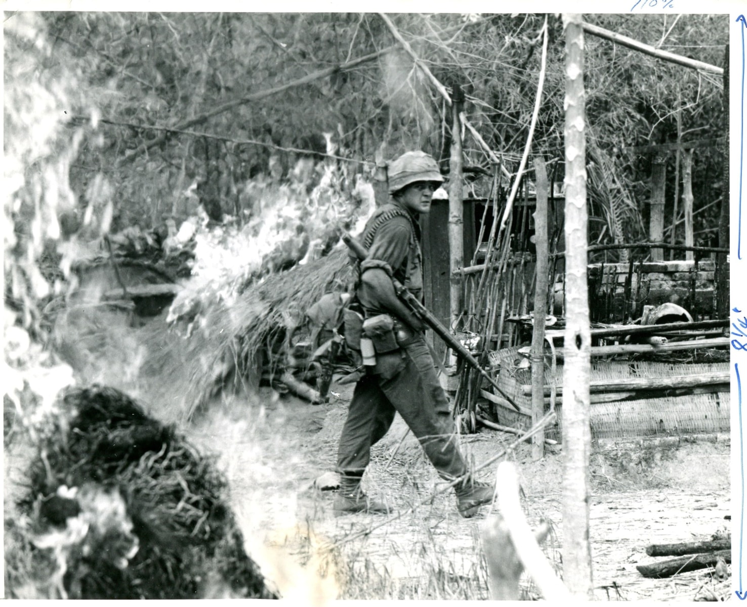Anonymous- Soldier Walking through Bush Cover