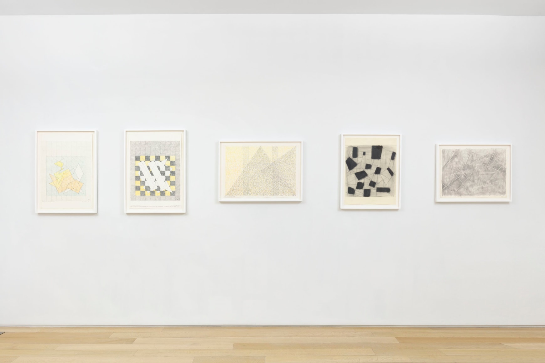 installation view with framed drawings