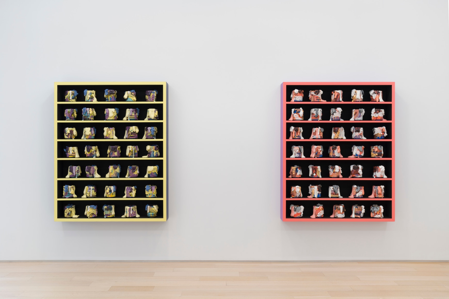 installation view with ceramic vessels