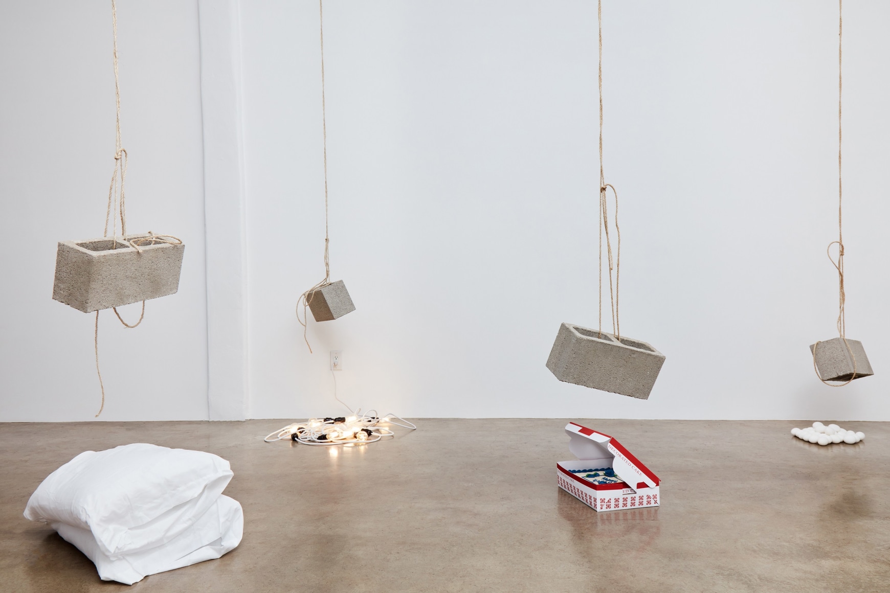 Bas Jan Ader&nbsp;, Light vulnerable objects threatened by eight cement bricks