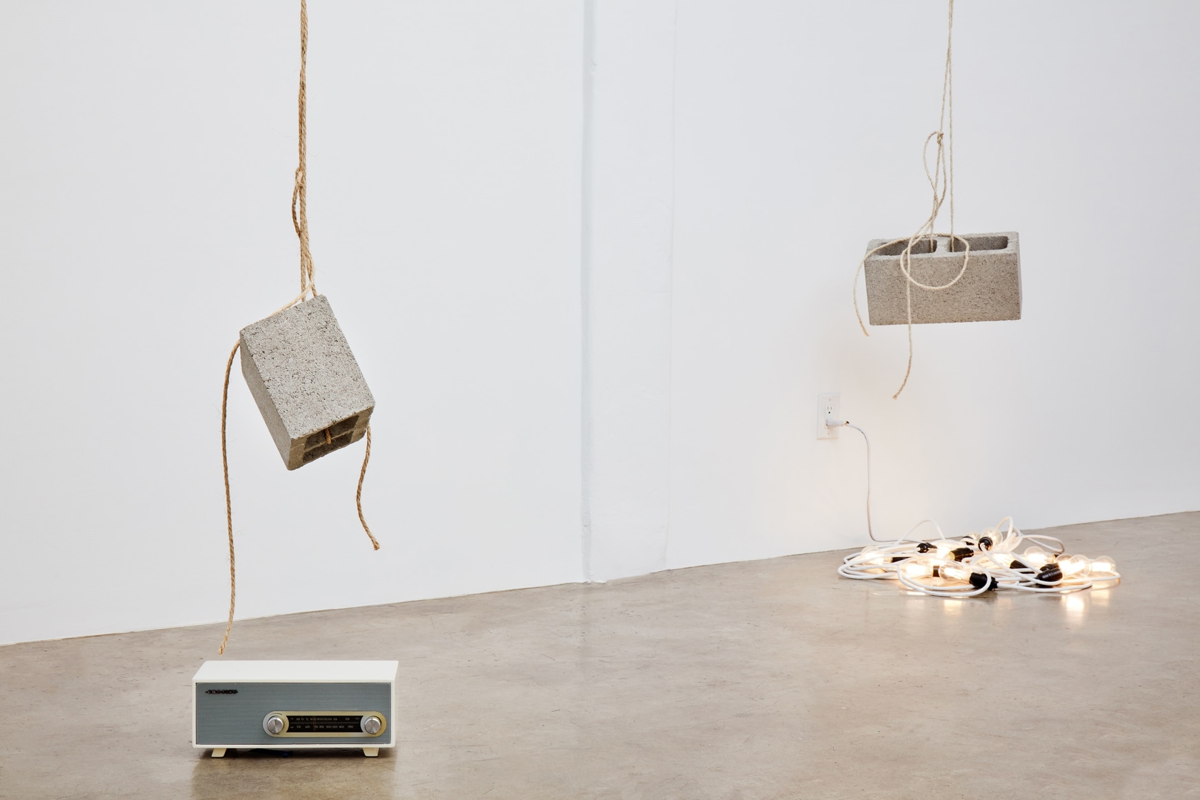 Bas Jan Ader&nbsp;, Light vulnerable objects threatened by eight cement bricks