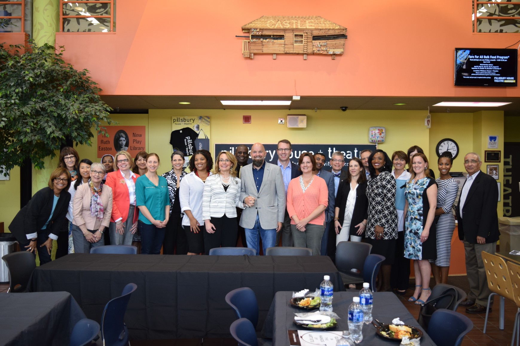 Jonathan Ferrara with Gabby Giffords and Pillsbury United Communities at the opening of Guns In The Hands of Artists at Pillsbury House Theater in Minneapolis, May 3, 2016