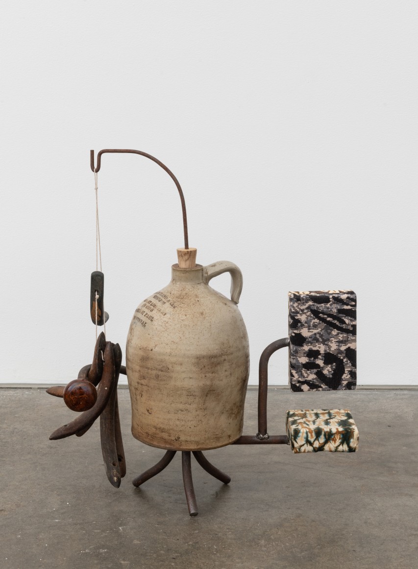 Fishing: a construction, 2018, Ikat fabric, dress fabric, jug, chair seat supports, metal, doorknob, string, wooden cork