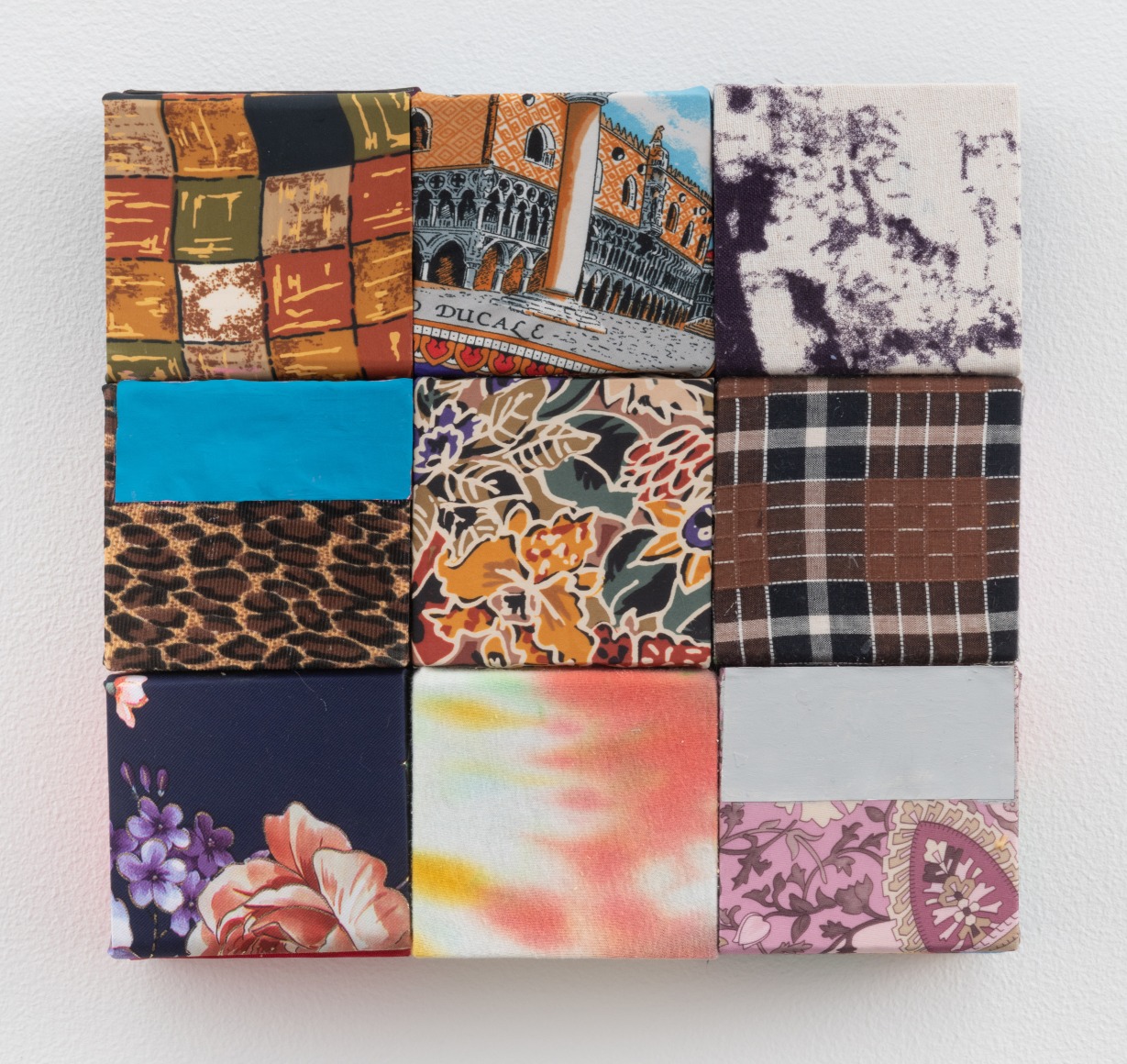 Picture becomes texture, 2021, wooden blocks, dress fabric, souvenir scarf fabric, paper, Flashe acrylic