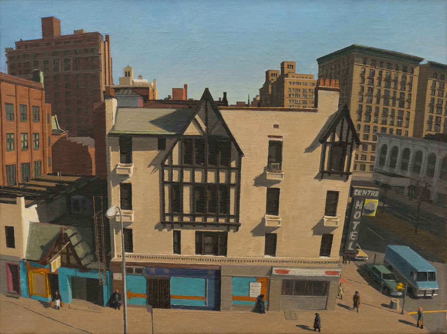 View from above of hotel, street, and buildings behind it