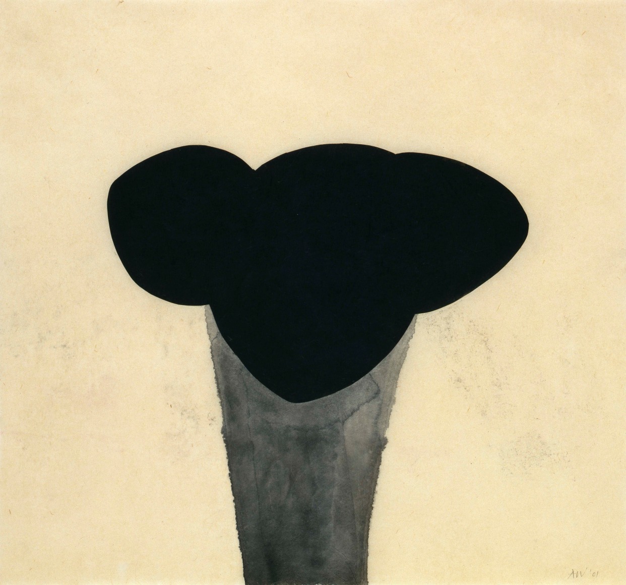 yellow paper with deep black ink in center, forming an abstract shape