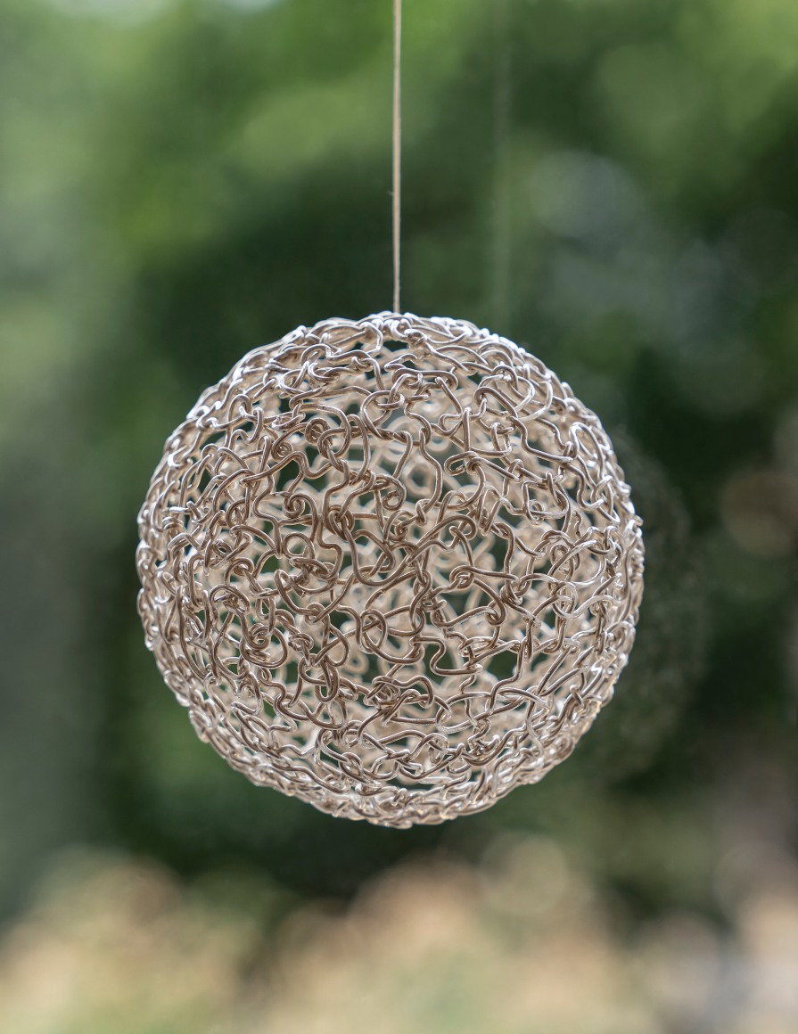 silver wired finely twisted to form a sphere