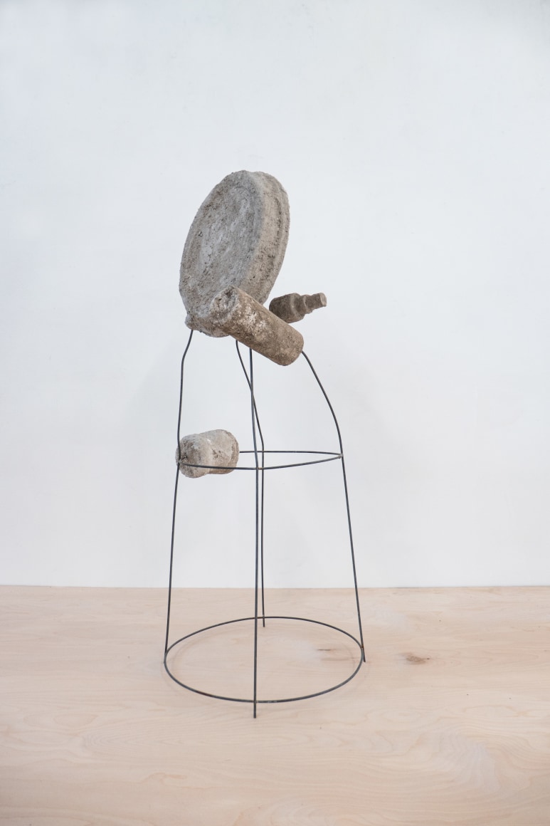 Erin Woodbrey  Grandmother (From the Carrier Bag Series), 2021  Single-use plastic and metal containers, foam, ash, plaster, gauze, and steel wire  76.2 x 30.5 x 30.5 cm / 30 x 12 x 12 in