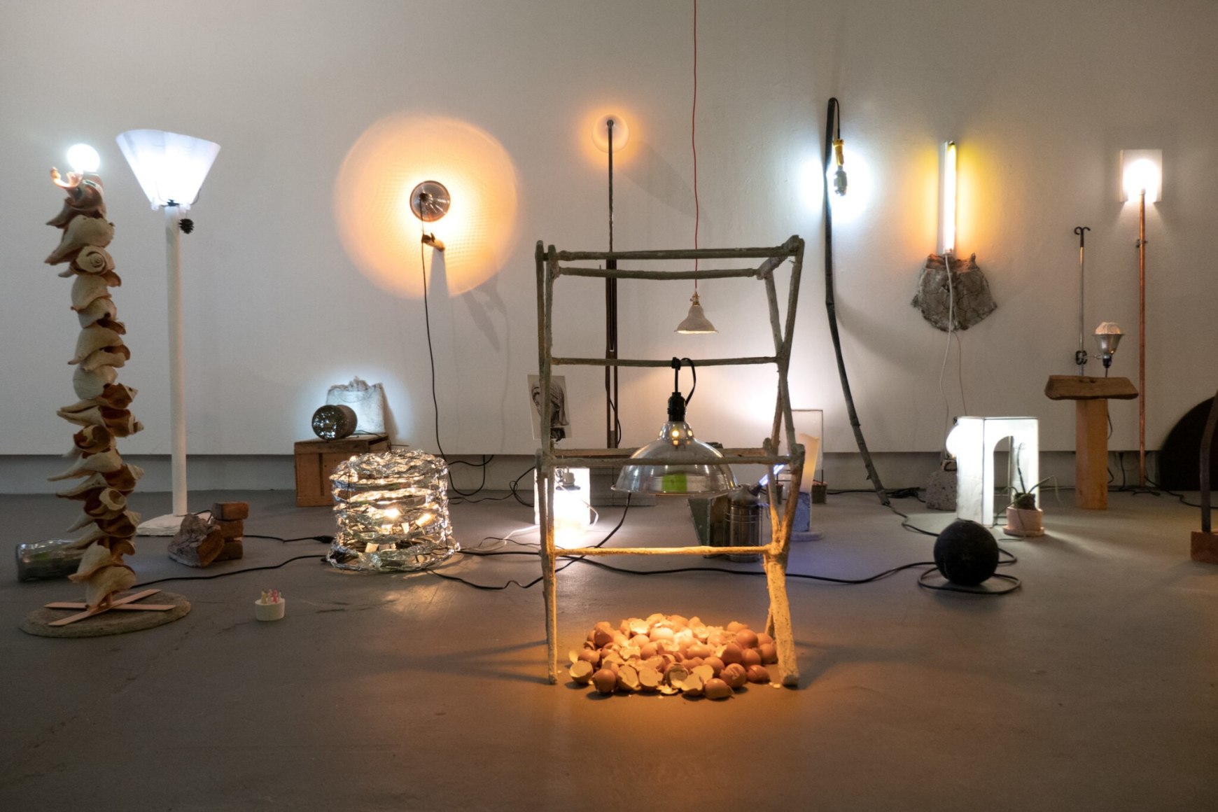 Erin Woodbrey  Illuminators for the Geologic Afterlife - 2022  Mixed-media light installation with found objects  Variable dimensions  Detail view