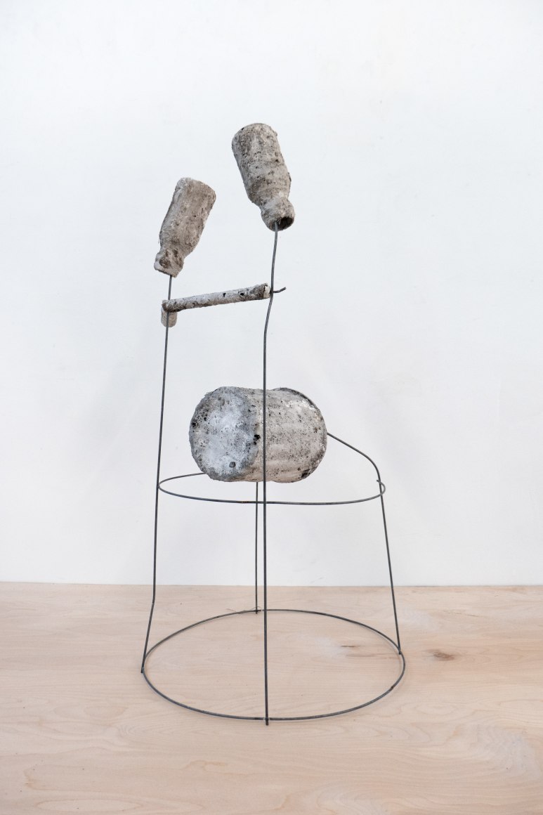 Erin Woodbrey  The Thinker (From The Carrier Bag Series), 2020  Single-use plastic containers, cork, ash, plaster, gauze, and steel wire  77.47 x 41.91 x 38.73 cm / 30 1/2 x 16 1/2 x 15 1/4 in