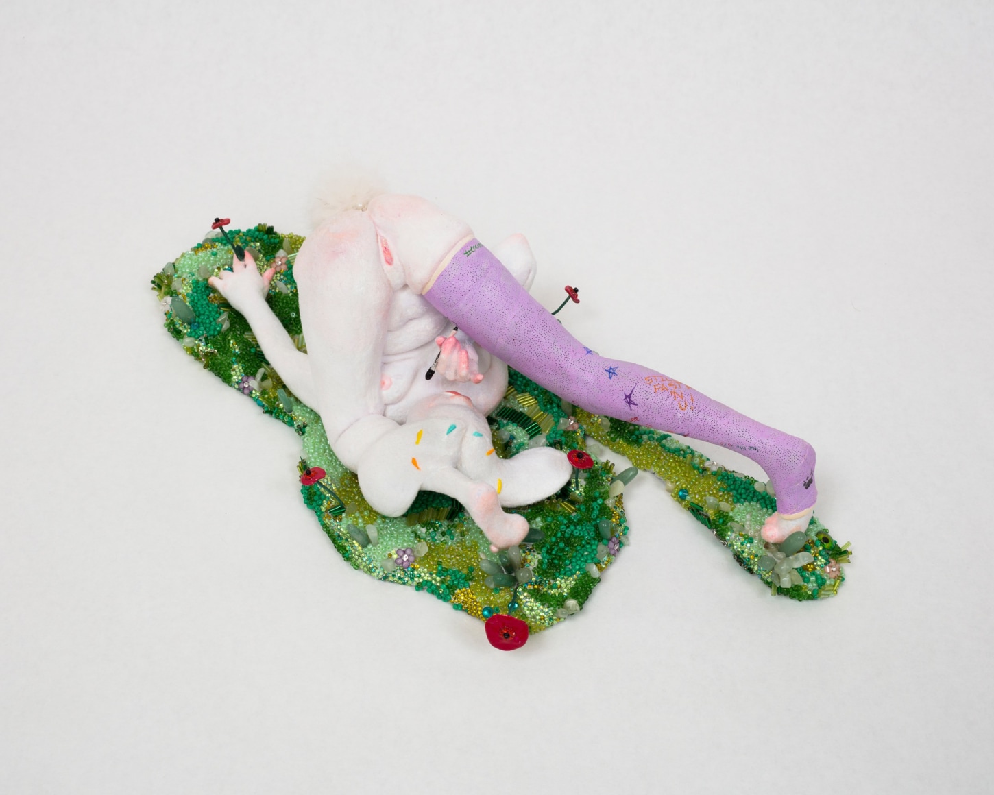 Autumn Wallace  Something/Anything? (Disc 2 Track 9), 2021  Clay, acrylic paint, flocking, upcycled fur, Swarovski crystals, aventurine, jade, acrylic eyes, assorted cabochons, and glass beads  15 x 35.5 x 13 cm / 6 x 14 x 5 in