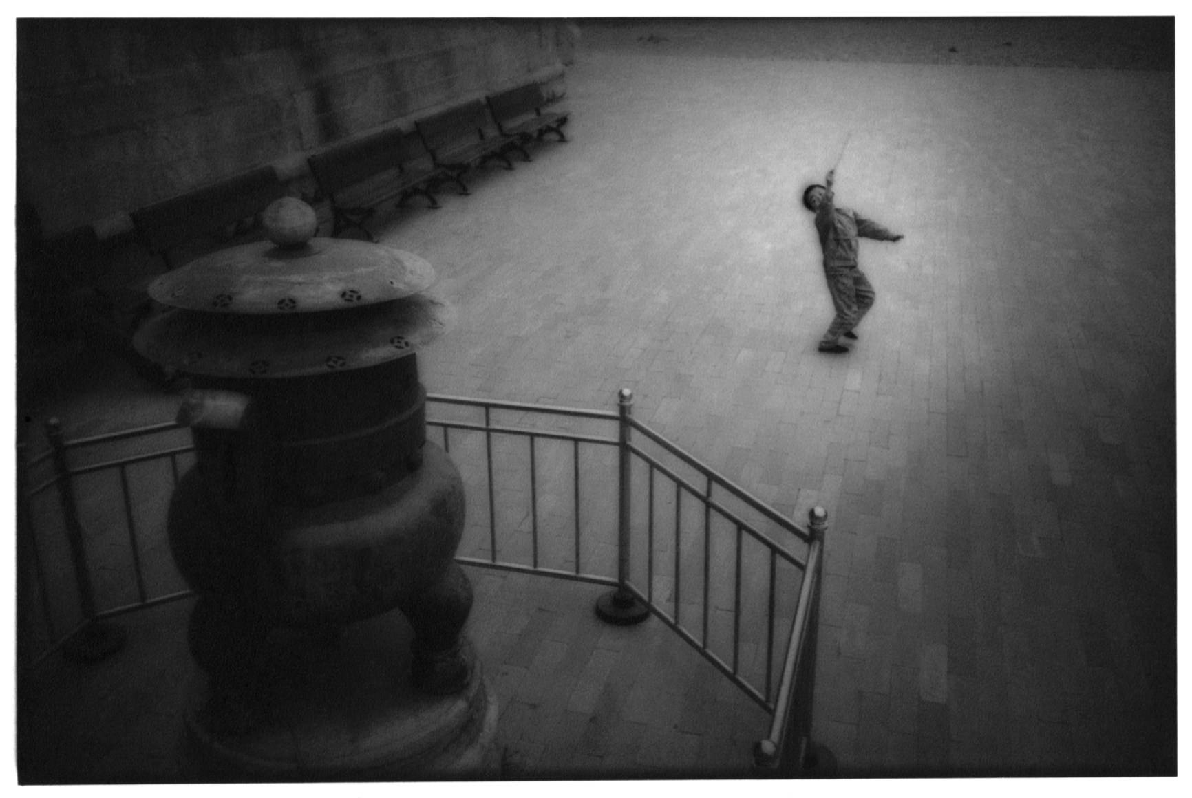 Boy playing in courtyard, Beijing, China, 1994 - Empire | James Whitlow Delano Documentary Fine ArtEmpire | James Whitlow Delano Documentary Fine Art