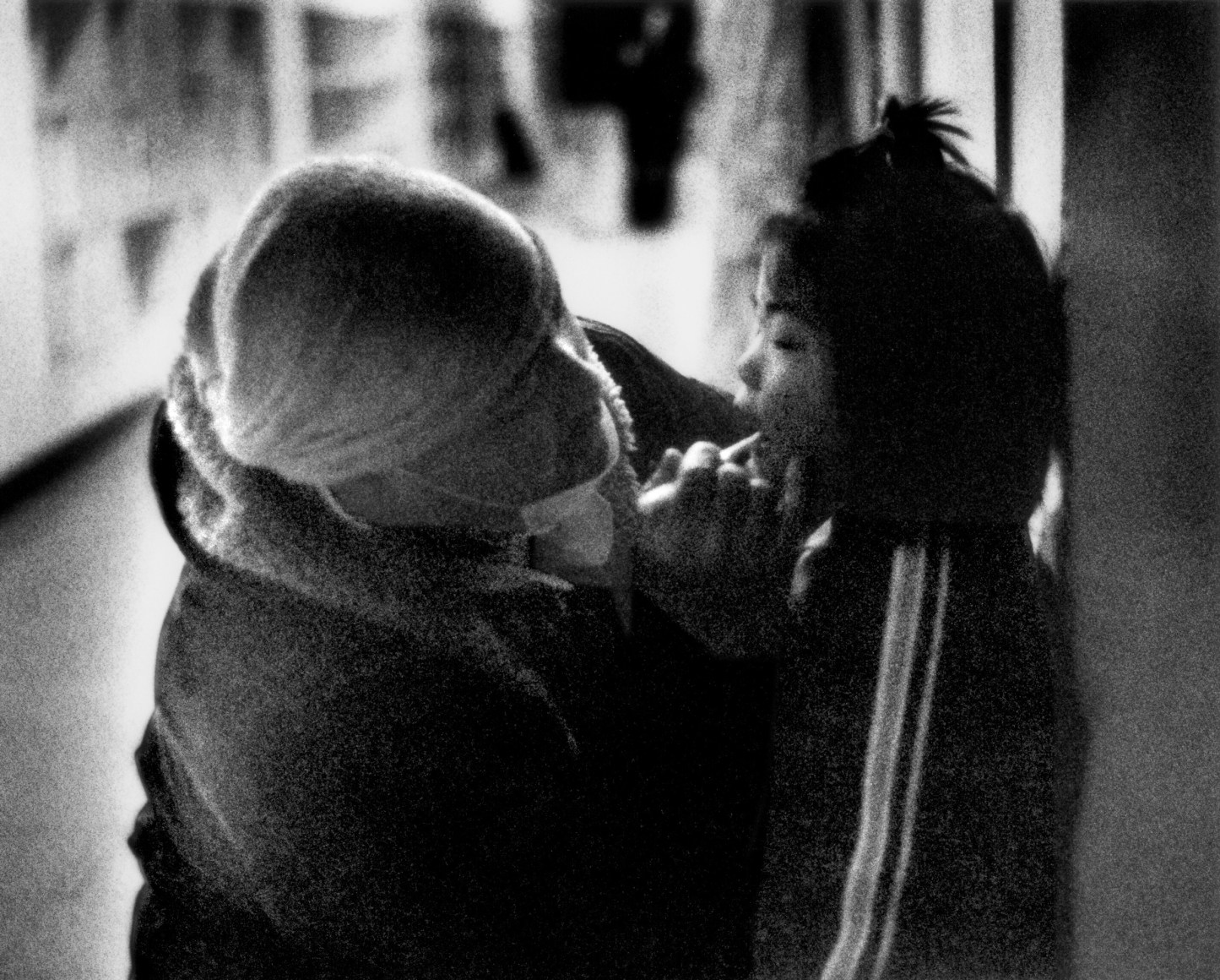 James Whitlow Delano, Black Tsunami, Father brushes his daughter's teeth at an unheated evacuation center for survivors of the Tsunami in Otsuchi, Iwate Prefecture, Japan, 2011, Sous Les Etoiles Gallery