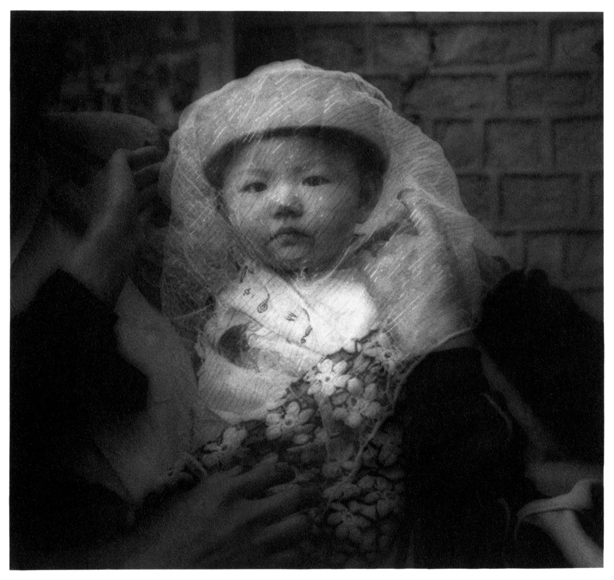 Veiled infant, Gansu Province, China, 1994 - James Whitlow Delano