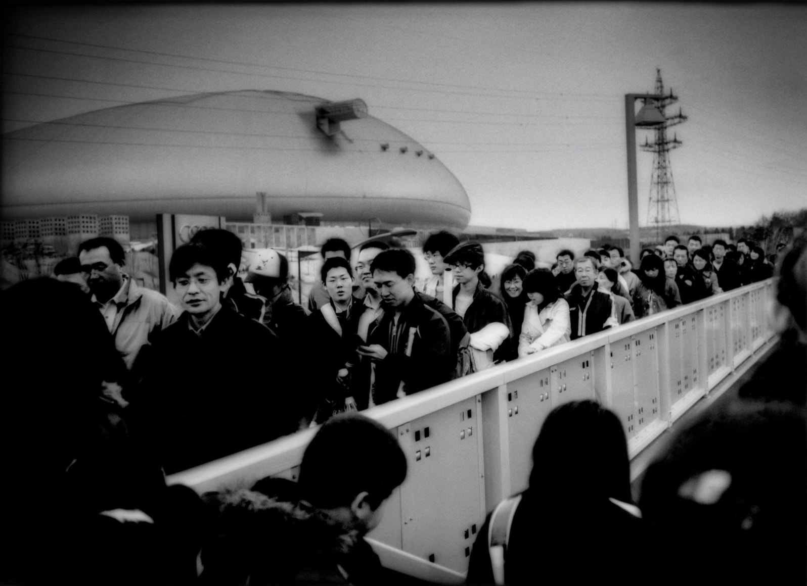 People leave Sapporo Dome, Hokkaido, Japan, 2005 - Mangaland | James Whitlow Delano Documentary Photography