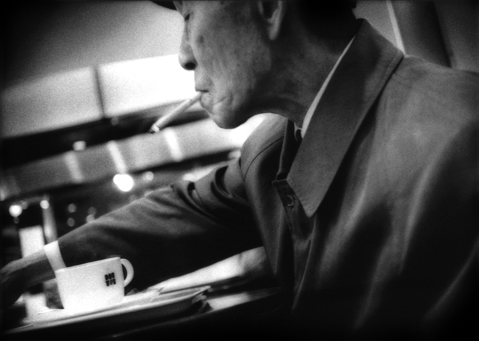 A drag and a coffee, Ginza, Tokyo, Japan, 2006 - Mangaland | James Whitlow Delano Documentary Photography