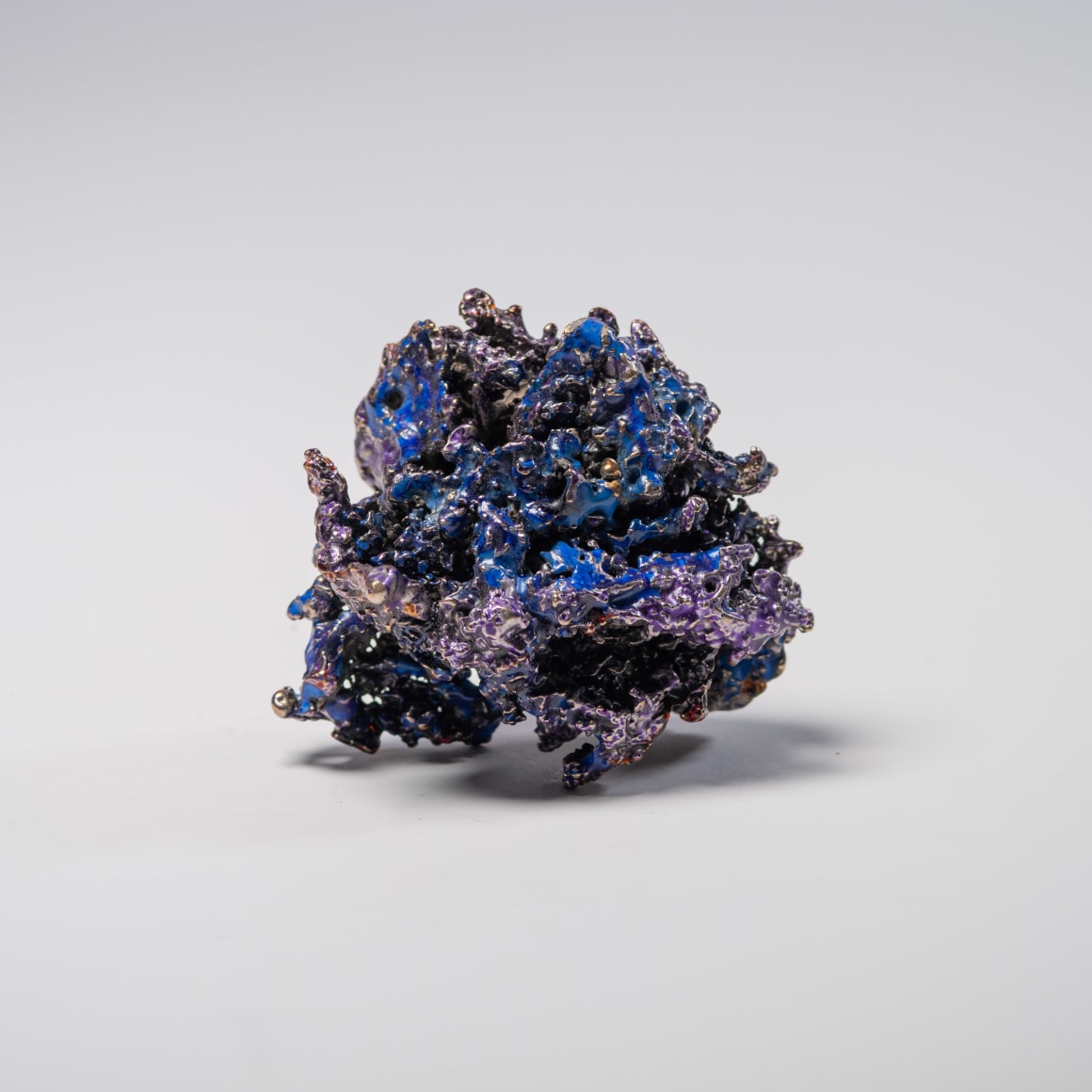 #241:, bronze, pigmented epoxy 2.5 x 3 x 3 in