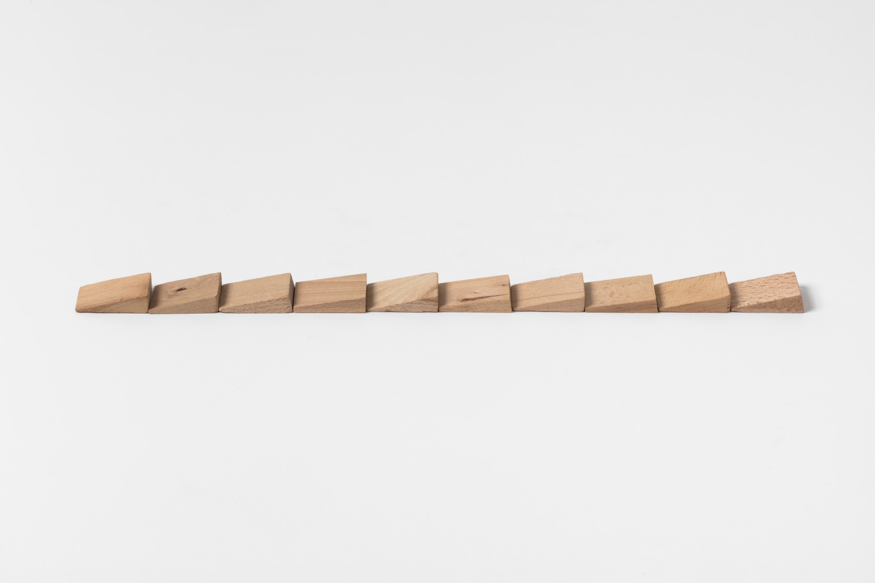 Carl Andre Ten Wood Wedge Line, 2016