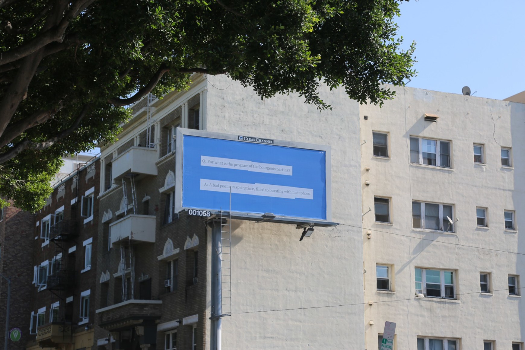Larry Johnson, Q&A 2020. Billboard at W. Seventh St. and S. Rampart Blvd., Los Angeles 90057 (facing south). 144 × 288 in. (365.8 × 731.5 cm). Courtesy of the artist, David Kordansky Gallery, Los Angeles, and 303 Gallery, New York. Installation view, co-produced by The Billboard Creative for Made in L.A. 2020: a version. Photo: Joshua White / JWPictures.com
